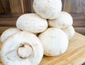 Field mushrooms on a cutting board Royalty Free Stock Photo