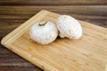 Field mushrooms on a cutting board Royalty Free Stock Photo
