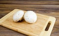 Field mushrooms on a cutting board Royalty Free Stock Photo