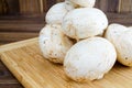 Field mushrooms on a cutting board Royalty Free Stock Photo