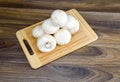 Field mushrooms on a cutting board Royalty Free Stock Photo