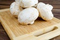 Field mushrooms on a cutting board Royalty Free Stock Photo