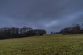 Field near Nemci small village in Ceske Stredohori mountains in winter day Royalty Free Stock Photo