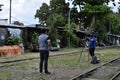 Field news reporter and vlogger working on their gears during the arrival of President Rodrigo R. Duterte to inaugurate the openin