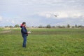 A man with a remote control in his hands. Flight control of the drone. Phantom