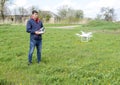 A man with a remote control in his hands. Flight control of the drone. Phantom