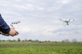 A man with a remote control in his hands. Flight control of the drone. Phantom Royalty Free Stock Photo