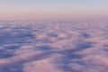 A field of pink clouds at sunset. View from above. Royalty Free Stock Photo