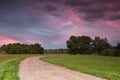 Field road in the sunset Royalty Free Stock Photo