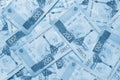 A field of Russian banknotes 200 rubles. Light blue tinted background or wallpaper on an economic or financial theme. Bills depict