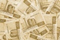 A field of Russian banknotes 200 rubles. Light brown tinted background or wallpaper on an economic or financial theme. Bills