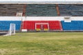 Field and tribunes of abandoned stadium