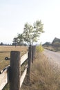 field with wooden fence in the front Royalty Free Stock Photo