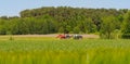 Poland Ostrowiec Swietokrzyski June 1, 2023 at 12:03. Zetor and Deutshe Fahr tractors raking hay . Royalty Free Stock Photo