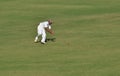 Fielding Attempt During Cricket Match