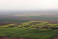 Fields from the air. Fields aerial photo. Aerial photography of green fields. Green fields aerial view. Royalty Free Stock Photo