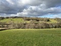 Fields and hills, with heavy clouds, on a winters day in, Oxenhope, Yorkshire, UK