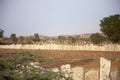 Fields in india stone fence cultivated