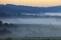 Morning fog over fields and meadows of Podkarpacie region in Poland