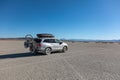 Honda Pilot car with Yakima cargo box on the roof and bike racks covered in dust