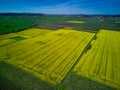 Fields with a plant in a valley against the background of the village and the sky in Bulgaria Royalty Free Stock Photo