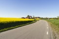 Fields with rapeseed flowers in Sweden on a sunny spring day Royalty Free Stock Photo