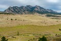 Fields Rolling in front of Flat Irons Royalty Free Stock Photo