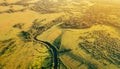 Fields and small narrow winding river aerial view Royalty Free Stock Photo