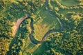 Fields and small narrow winding river aerial view Royalty Free Stock Photo
