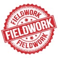 FIELDWORK text on red round stamp sign