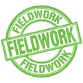 FIELDWORK written word on green stamp sign