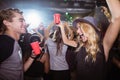 Fiends dancing in nightclub Royalty Free Stock Photo