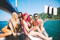 Fiends having fun on a sail boat Royalty Free Stock Photo