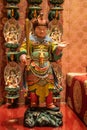 Fierce looking guard statue with sword in Buddha Tooth Relic Temple, Singapore Royalty Free Stock Photo