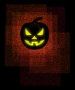 A fierce looking jack-o-lantern is seen glowing yellow from the eyes, nose and mouth