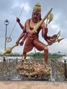 Fierce Multi-Armed Warrior Statue at Mahakal Temple Complex Royalty Free Stock Photo