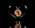 Fiery ball in glass heart Royalty Free Stock Photo