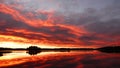 Fiery cloud covered sunrise at lake Ãâje in Dalarna in Sweden