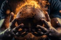 Fiery detail of an American football in the hands of a player in action Royalty Free Stock Photo