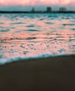 Fiery Farewell: Sun Dips Below Horizon in Dramatic Beach Sunset