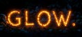 Fiery Glow Text Effect Emblazoned with Blazing Sparks in the Dark on a Textured Ground Royalty Free Stock Photo