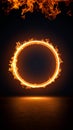 Fiery glowing ring of fire with flames on a dark background and reflection Royalty Free Stock Photo