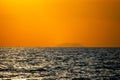 Fiery horizon, dramatic ocean sunset in vibrant hues over dark waters, Royalty Free Stock Photo