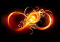 Fiery infinity symbol with peacock feather Royalty Free Stock Photo