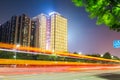 Fiery light trails on the city road