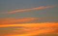 Fiery orange clouds in witer evening sunset Royalty Free Stock Photo