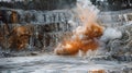 Fiery orange explosions burst across the quarry as workers use highpowered drills to break apart the tougher sections of Royalty Free Stock Photo