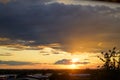 Fiery orange sunset over countryside with clouds Royalty Free Stock Photo