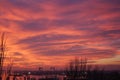Fiery orange sunset sky on the background of the city. Beautiful sky Royalty Free Stock Photo