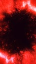 Fiery red nebula cloud with glowing particles drifting around a dark central void in a cosmic scene Royalty Free Stock Photo